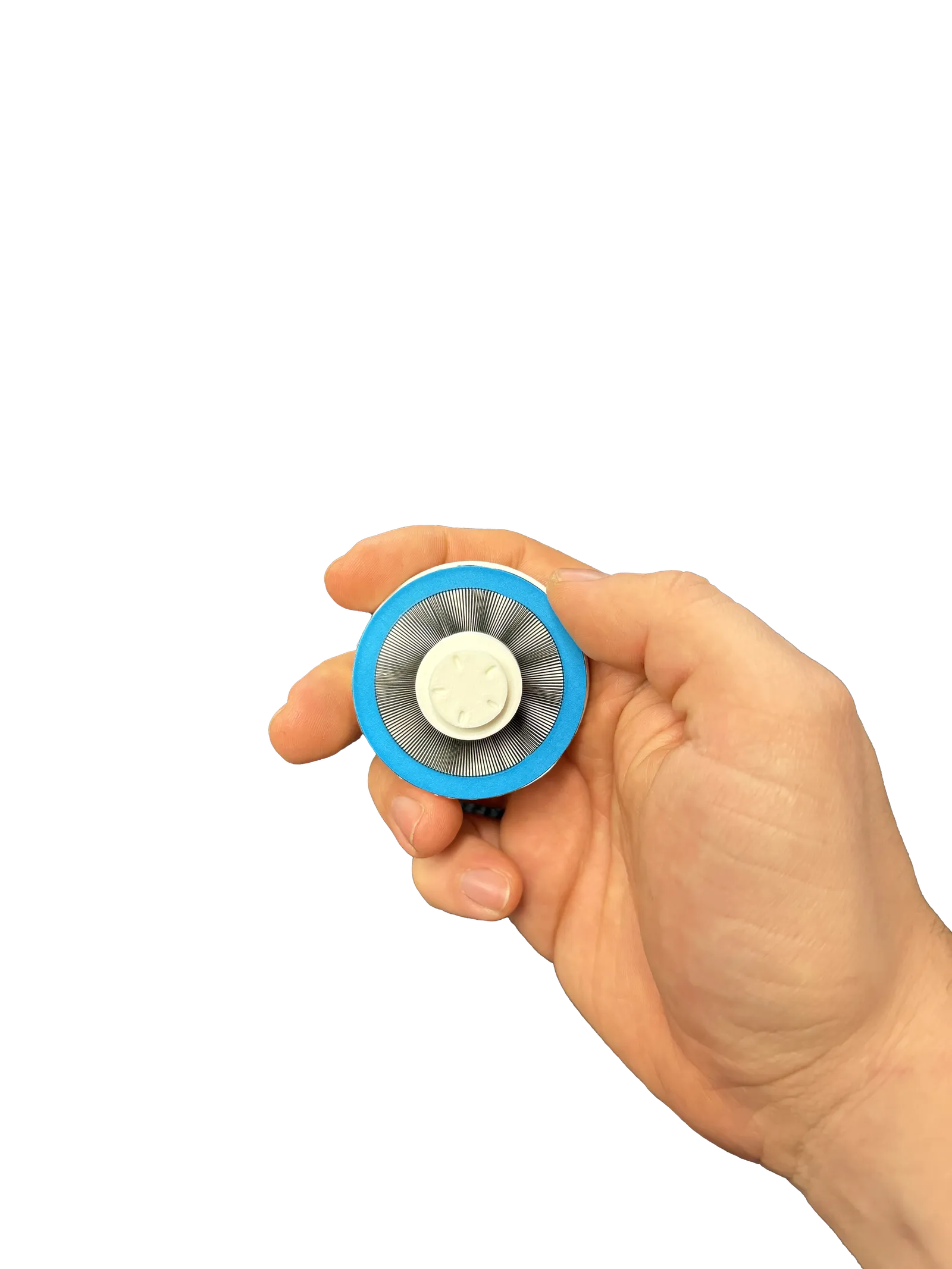 Image of a hand holding a white dial with a circular moire pattern and blue outlined.