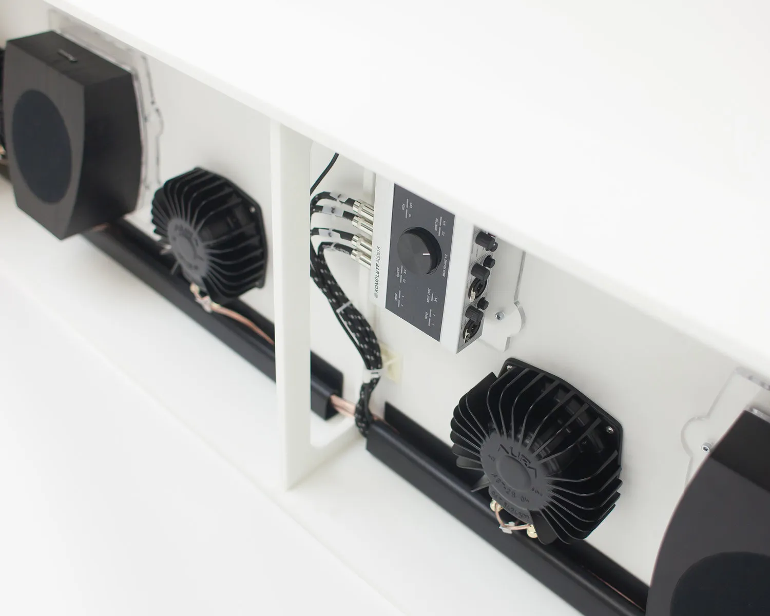 Photo showing the underside of the bench which has been instrumented with speakers and transducers.